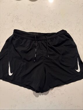Nike Black Men’s Athletic Running Shorts with white swoosh.